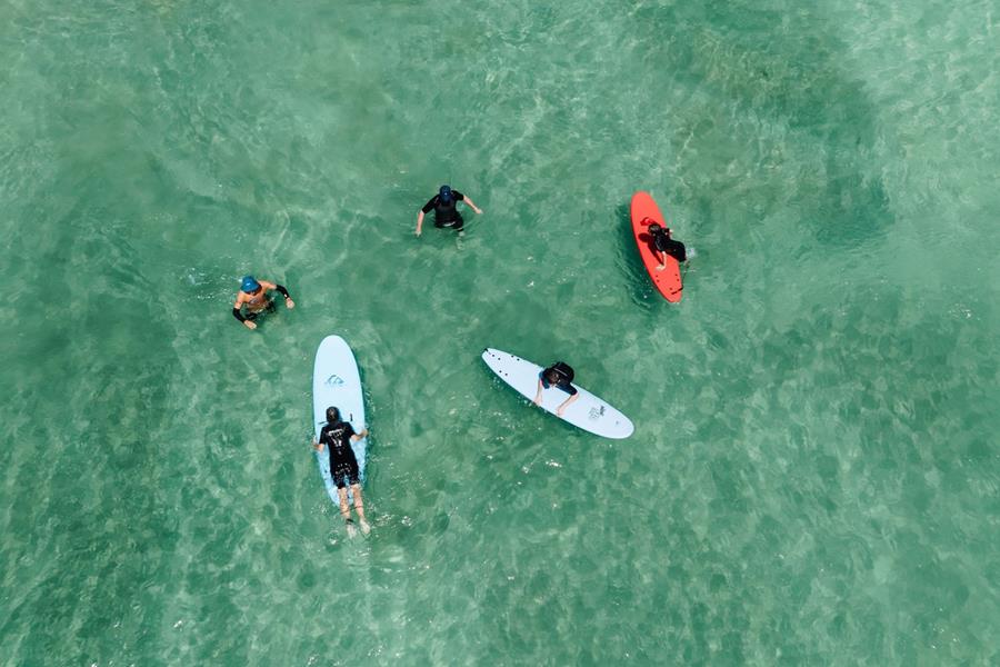 Family at a learn to surf class