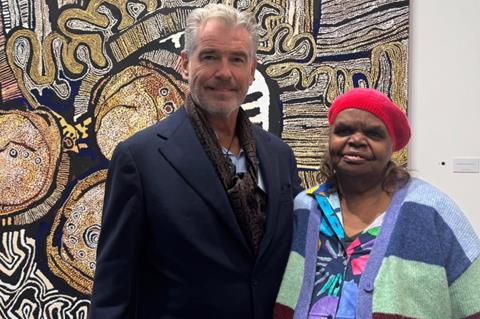 Pierce Brosnan with artist