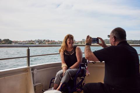 Woman in wheelchair on cruise deck