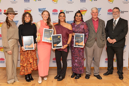 Winners holding certificates