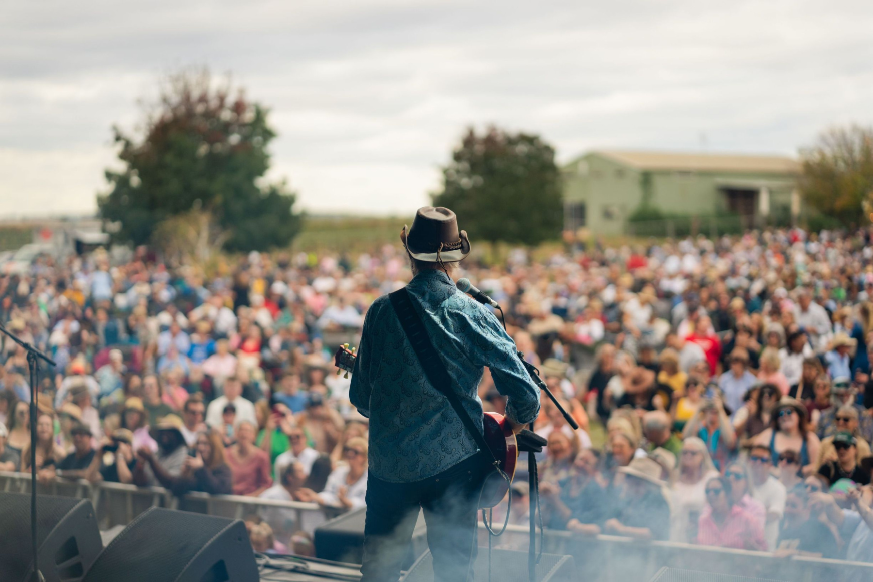 Man performing at an outdoor concert