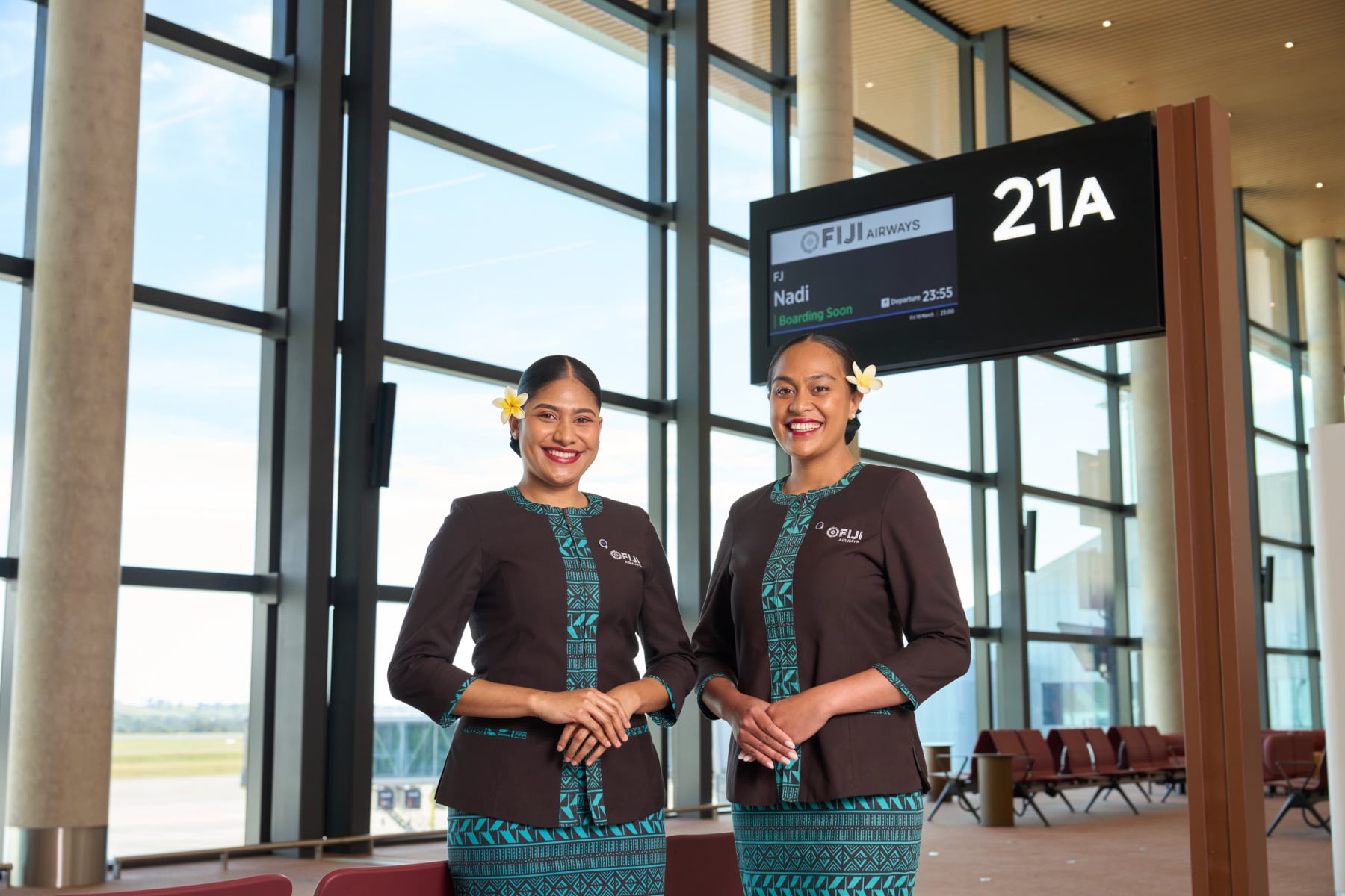 Two Fji Airways staff members at Western Sydney International Airport terminal