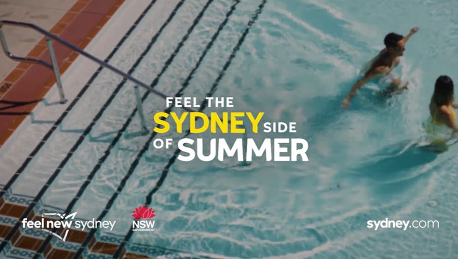 Couple wading in a swimming pool